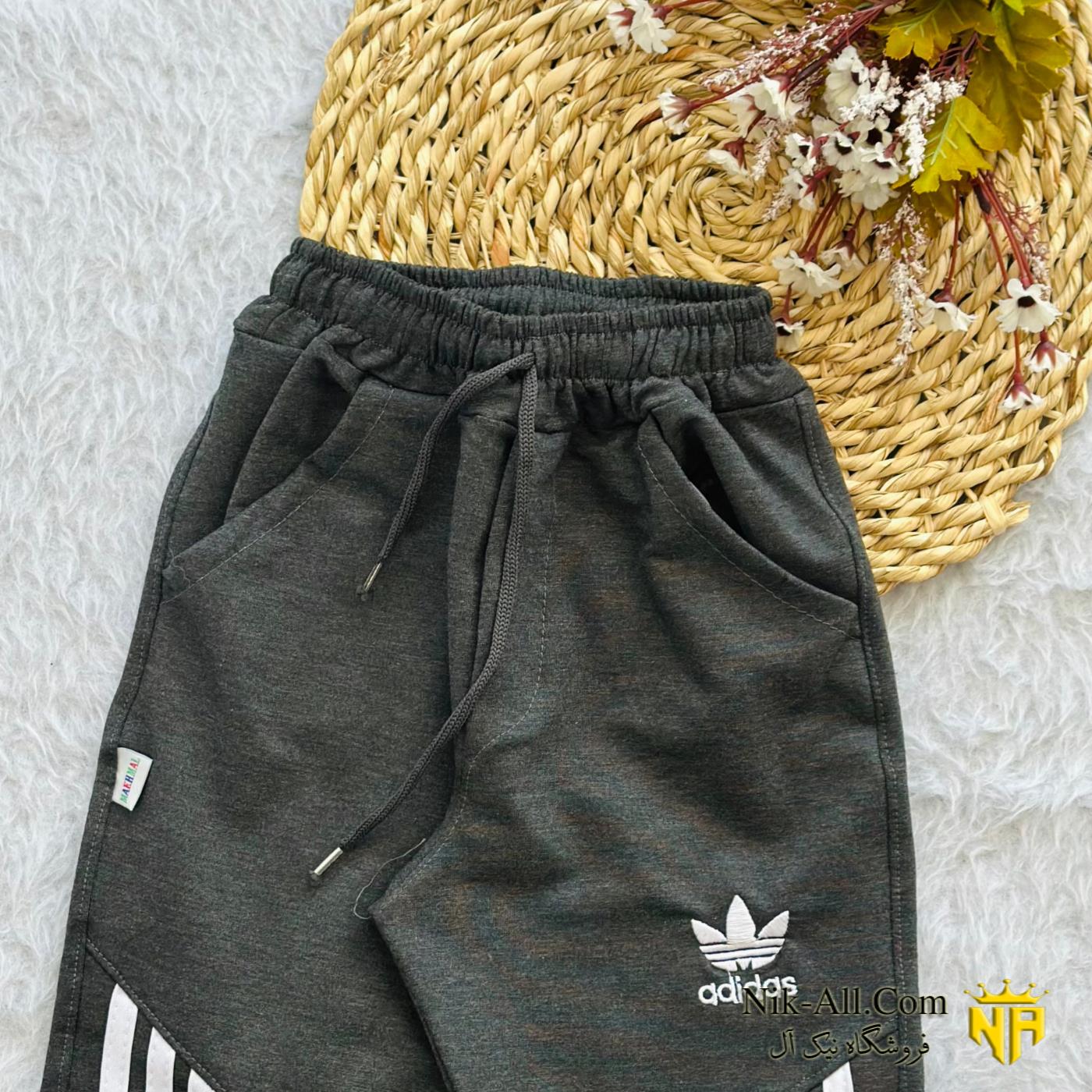 شلوار نواری توسی تیره